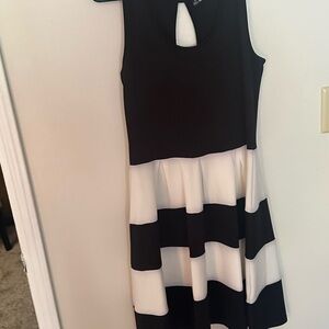 Cute new dress very soft and comfortable never worn without tags
